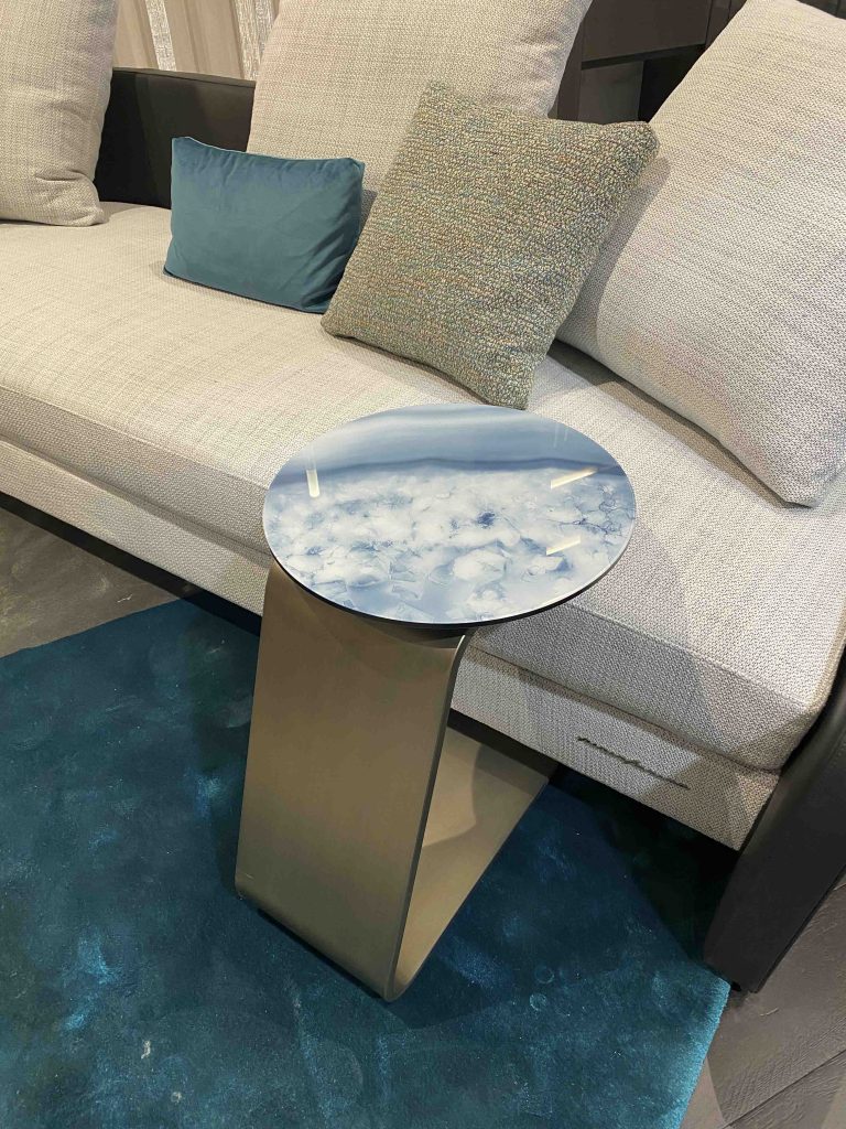 Round side table with pale blue stone top